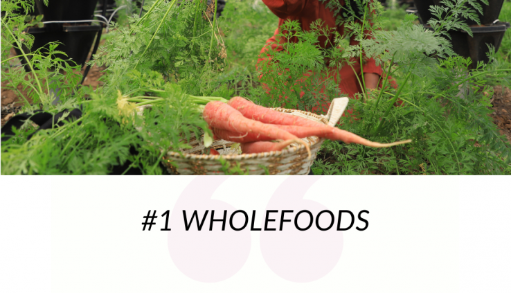 Lady in a garden where she is plucking carrots